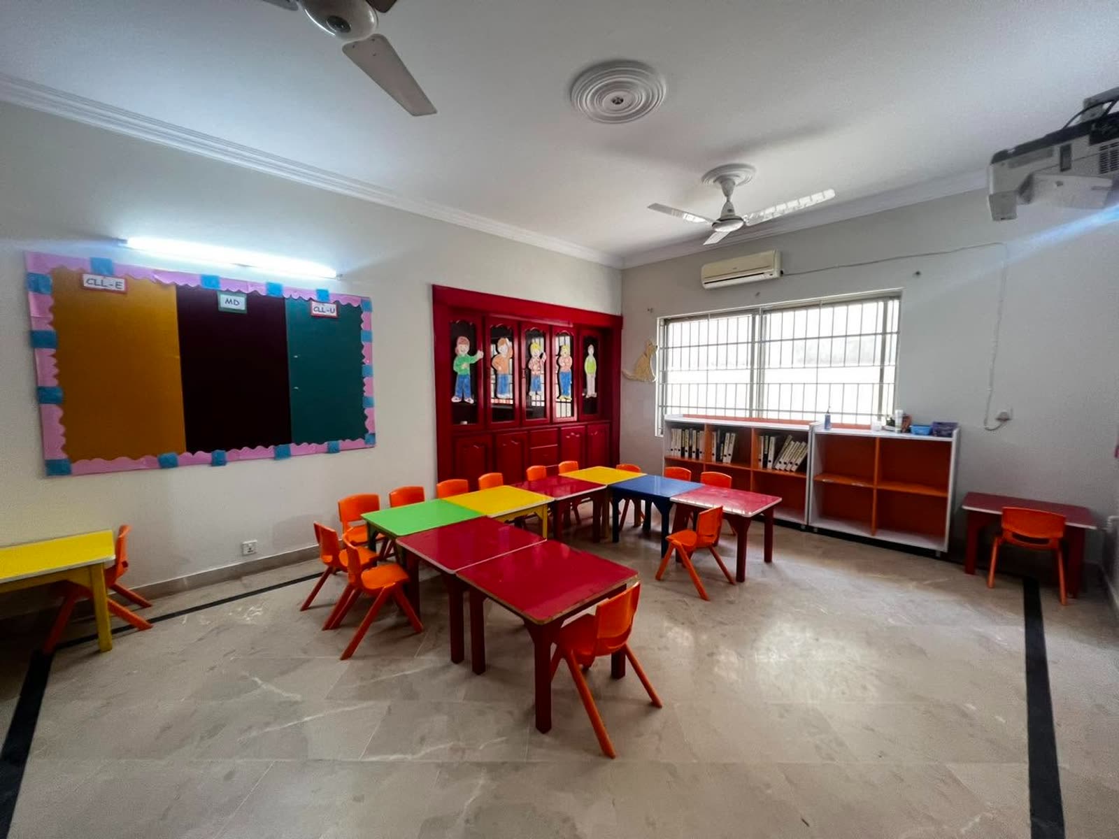 Bright pre-primary classroom with colourful tables at Soan Garden Campus