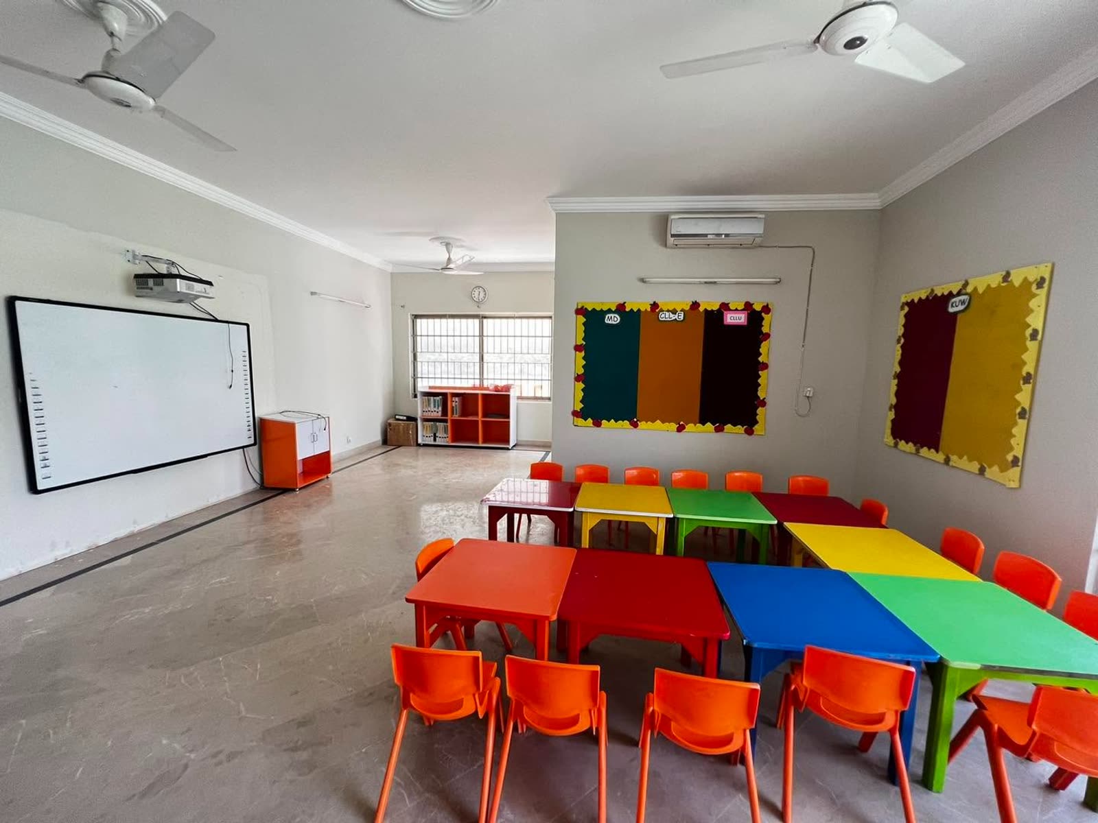 Smart classroom with interactive board and group tables at Soan Garden Campus